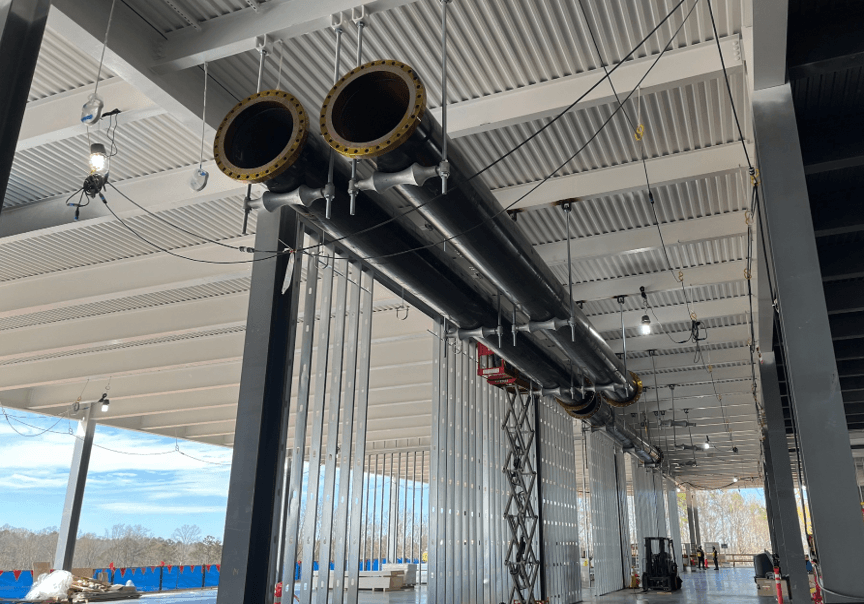 Infrastructure team inspecting a large bridge project